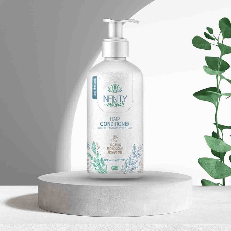 انفينتي ناتشورال إنفينتي ناتشورالز بلسم للشعر بزيت الارجان المغربي