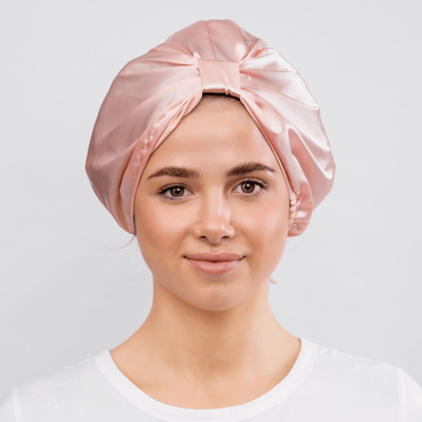 faces pink satin bonnet