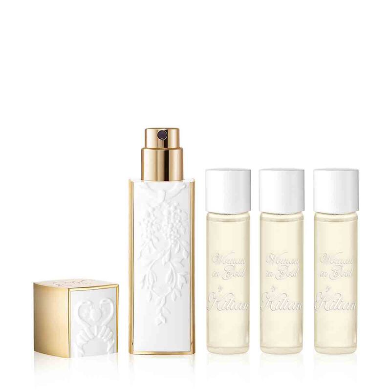 kilian paris woman in gold travel set