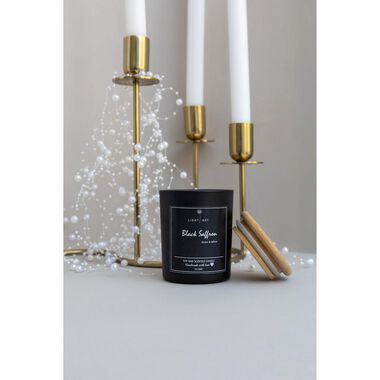 faces black saffron scented candle jar