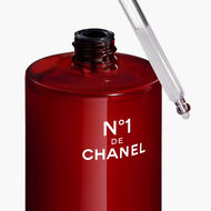 N°1 DE CHANEL REVITALIZING SERUM SMOOTHS AND PROVIDES RADIANCE, FOR YOUNGER-LOOKING SKIN faces n 1 de chanel revitalizing serum smooths and provides radiance for younger looking skin