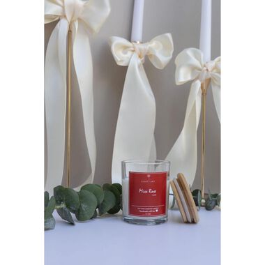 faces miss rose scented candle jar