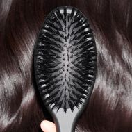 faces the dresser oval dressing brush