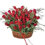Red Roses and Eucalyptus Basket faces red roses and eucalyptus basket