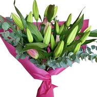 faces hand tied bouquet   lillies and eucalyptus