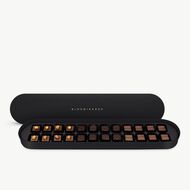 faces large chocolates oval black box