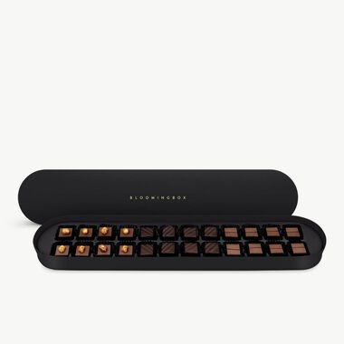 faces large chocolates oval black box