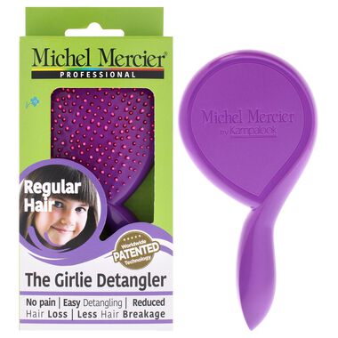 The Girlie Detangler Brush Regular Hair faces the girlie detangler brush regular hair